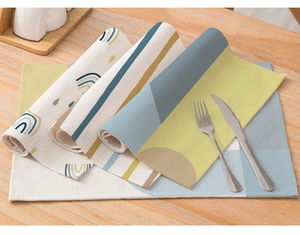 Detailed texture of cotton linen placemats with abstract geometric patterns on wood table