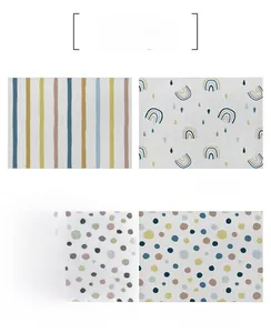 Detail view of four linen table mat patterns with geometric drops and checkered designs