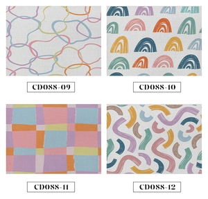 Detailed view of four modern geometric patterns on linen placemats with fabric texture