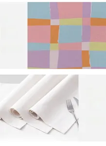 Close-up of geometric pattern digital printing and fine stitching on linen placemats