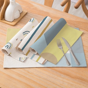 Abstract geometric linen placemats with colorful rainbow patterns for home dining tables