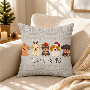 Detail of Christmas pillow cover showing peach skin fabric and cute puppy prints