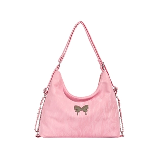 Chic pink textured shoulder bag featuring a metallic butterfly logo and adjustable chain strap