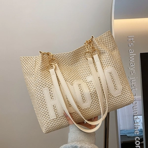 Chic beige woven straw tote bag with HELLO patch and gold chain leather strap