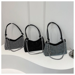 Detailed comparison of hobo bags in silver, black and light blue with sparkly rhinestones