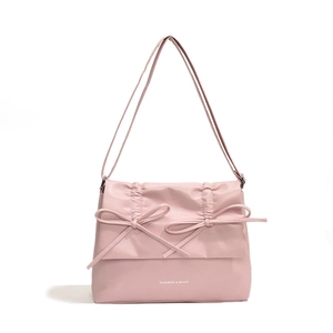 Minimalist light pink bow shoulder bag with glossy PU leather and fashion text print
