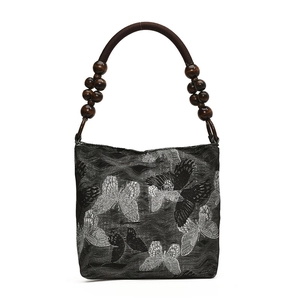 Vintage jacquard underarm bag with butterfly embroidery and wooden bead handle