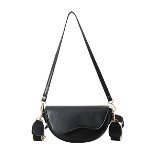 Chic black matte saddle bag with wavy flap, golden hardware and dual shoulder straps