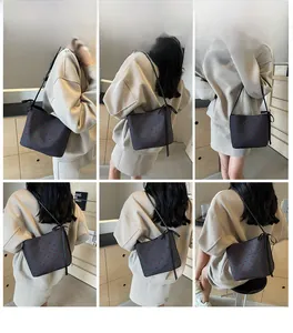 Detail shots of a grey shoulder bag with red heart patterns and decorative side bow ribbon