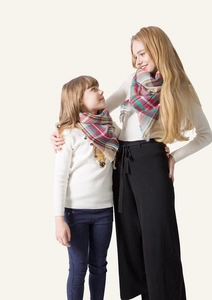Matching plaid cashmere-feel scarves for adults and kids with soft fringe edges