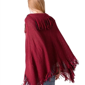 Women's autumn knit poncho with red and black mix pattern, lapel collar, and long tassels
