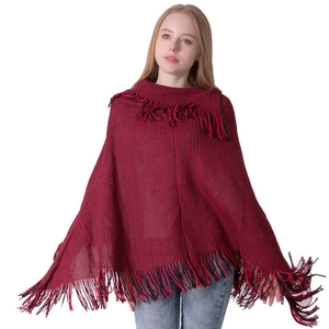 Women's knit poncho with red and black tassels featuring a stylish lapel and batwing sleeves