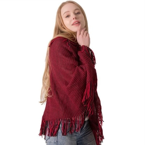 Women's autumn winter red and black knit poncho sweater with tassel hem and lapel collar