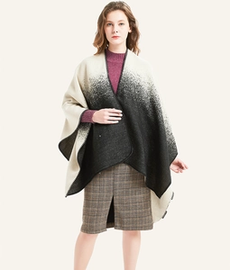 Detail of ombre black and white faux cashmere shawl with premium stitched edges