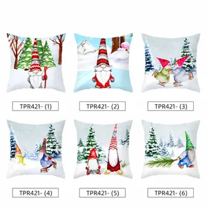Detailed display of six Christmas gnome patterns on peach skin holiday pillow covers
