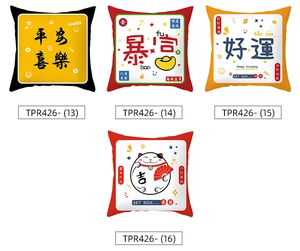 Detail view of four Chinese New Year festive cushion covers with gold lucky patterns