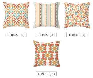 Detail of four square pillowcases with geometric floral and abstract art prints