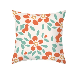 Floral geometric print decorative pillow cover in orange and green for home decor