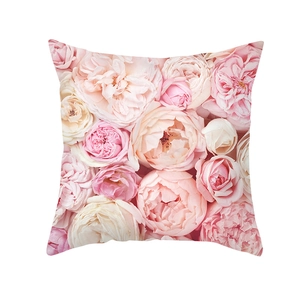 Detail of pink rose digital print on soft peach skin fabric square pillowcase