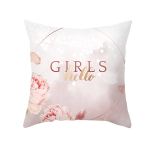 Detail of peach skin pillowcase with pink floral pattern and GIRLS hello text