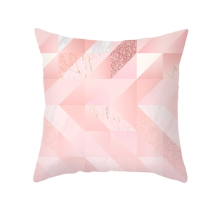 Detailed view of pink geometric pillowcase with marble textures and metallic glitter accents