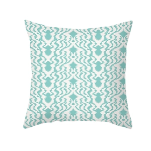Detailed pattern of a square teal and white geometric throw pillow cover on white background