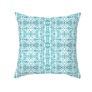 Close-up of geometric tribal pattern and fabric texture on blue square pillowcase