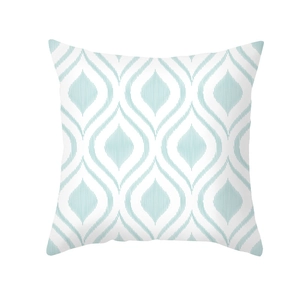 Detail view of the geometric blue wave pattern on the soft peach skin pillowcase