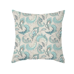 Close-up of blue paisley pattern on soft peach skin fabric square pillowcase