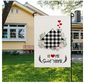 Detailed garden flag with watercolor flowers and Home Sweet Home text on lawn