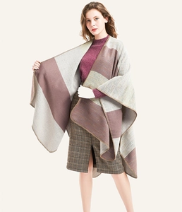 Detail of color-block striped shawl with fine overlock edge and thick knit texture