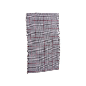Detailed view of plaid cashmere feel scarf featuring red stripes and fringe edges