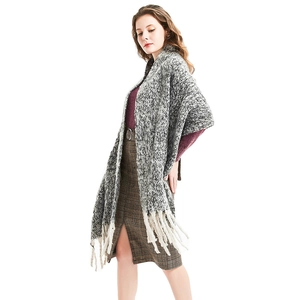 Chunky knit winter shawl wrap in grey melange texture with decorative thick tassels