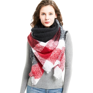 Classic large red and black plaid knit scarf with fringe edges for winter warmth