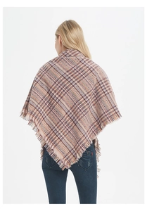 Detail of a thick plaid shawl with fringe edges in purple and orange vintage pattern