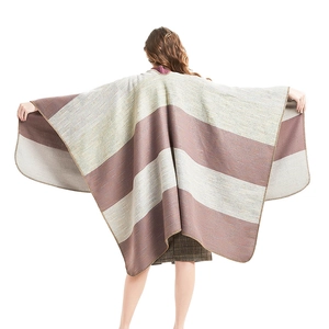 Striped knit shawl wrap with pink and grey wide patterns and decorative stitched edges
