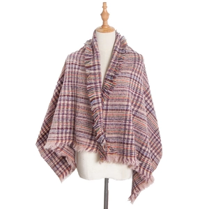 Thick multicolor plaid scarf shawl with fringes for winter, shown on a mannequin