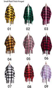 Matrix display of nine colorful plaid tassel scarves in thick knit mohair-like texture