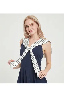 French style knitted shawl with black and white stripes over a dark blue dress
