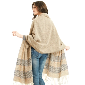 Thick beige winter scarf with colorful stripes and fringe tassels for women