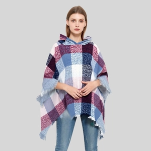 Women's hooded plaid poncho with classic check patterns and fringe hem in autumn style