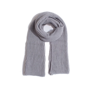 Detail of grey knitted scarf showing thick vertical ribbing texture and soft acrylic yarn