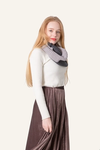 Detail of two-tone knit snood in lilac and dark grey showing thick knit texture