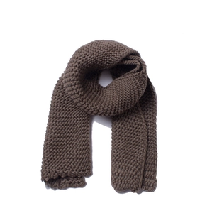 Close-up of thick coffee brown knit scarf showing premium chunky wool texture and patterns