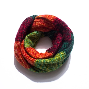Detail of multi-color block knit infinity scarf with dense flat stitch texture