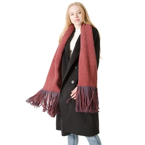 Thick solid color winter scarf with long fringe in reddish purple and dark purple tones
