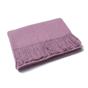 Detailed texture of lilac wool scarf with elegant tassel fringe and soft knit folds