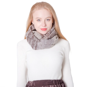 Winter striped knit loop scarf with brown and beige texture on white sweater