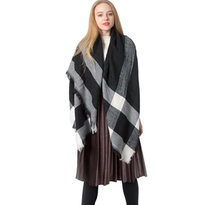 Classic black and white checkered oversized cashmere shawl with tassels for winter fashion