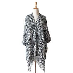Houndstooth cashmere-feel poncho shawl with tassel trim and open front design